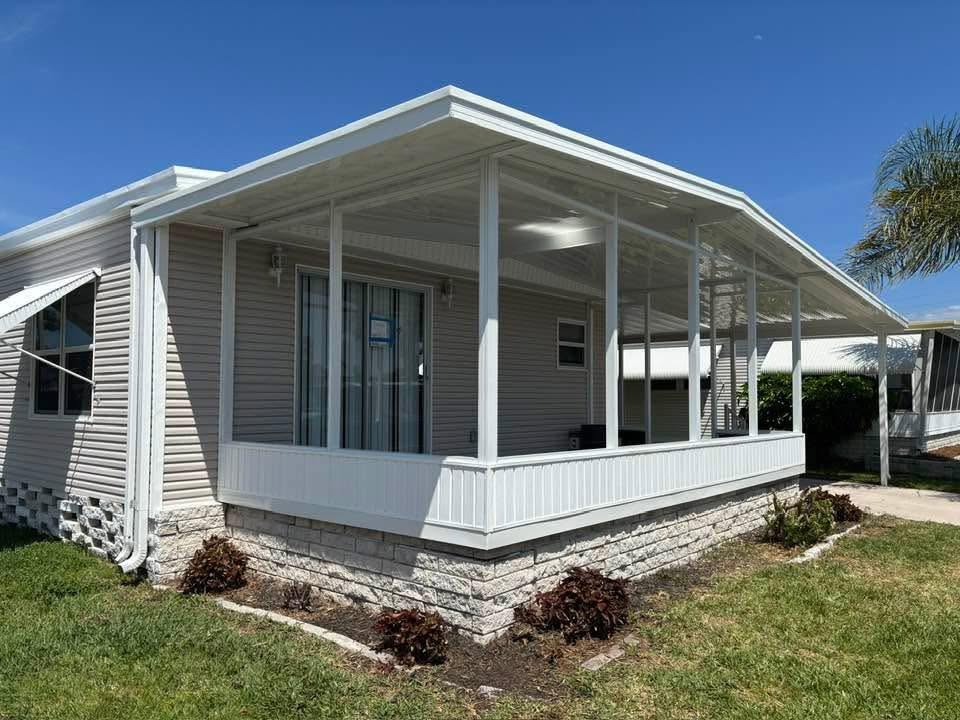 Solid-roof aluminum patio cover project by Daly Aluminum
